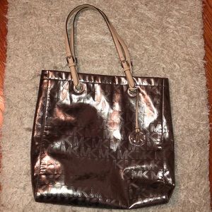 Michael Kors Silver metallic tote bag.